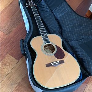 Guitar with strap, case, and picks